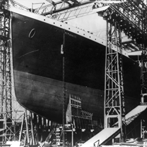 TITANIC: CONSTRUCTION, 1912. The RMS Titanic in drydock at Harland & Wolff shipyard, Belfast, Ireland. Photographed 1912