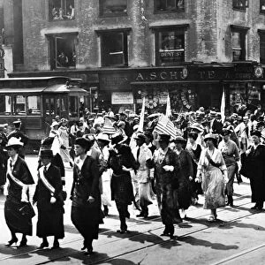 VICTORY PARADE, 1920. Suffragettes marching in a Victory Parade in New York, probably