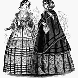 WOMENs FASHION, 1851. Winter fashion for ladies, home and walking dresses. Wood engraving from an American magazine of 1851