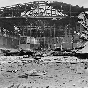 WORLD WAR II: HICKAM FIELD. Wreckage of a hangar at Hickam Field, Hawaii, after