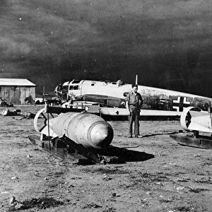 WORLD WAR II: LIBYA, c1943. Damaged German bombs at an airfield near Benghazi, Libya