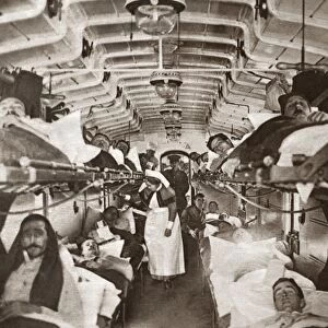 WWI: HOSPITAL TRAIN. British Red Cross hospital train with nurses, doctors and beds