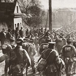 WWI: RUSSIAN RETREAT, 1915. German infantry passing through the town of Nowy Sacz