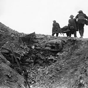 WWI: SOMME, 1916. Soldiers carrying a wounded man on a stretcher during The Battle