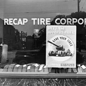 WWII: HOMEFRONT, 1942. A view of the window of the Recap Tire Corporation in Washington D