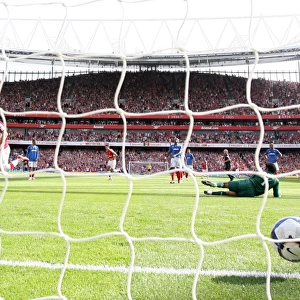 Aaron Ramsey shoots past Portsmouth goalkeeper David