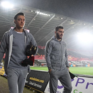 Arsenal Duo Mesut Ozil and Sead Kolasinac Arrive at Swansea City Stadium (January 2018)