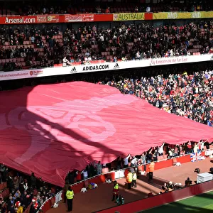 Arsenal Fans Unite: Cannon Banner at Emirates Stadium