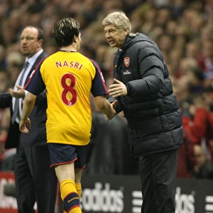 Arsenal manager Arsene talks with Samir Nasri