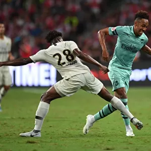 Arsenal Stars Clash: Aubameyang vs. Mbe Soh in Arsenal vs. PSG Showdown