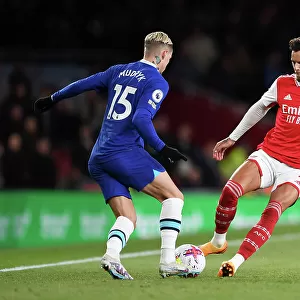 Arsenal vs. Chelsea: A Fight for Possession in the 2022-23 Premier League - White vs. Mudryk