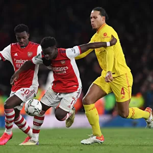 Arsenal vs. Liverpool Showdown: Nketiah, Saka Battle it Out Against Van Dijk in Carabao Cup Semi-Finals