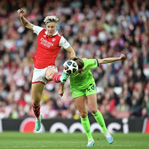 Arsenal vs. VfL Wolfsburg: Aerial Battle in the UEFA Women's Champions League Semifinal (2022-23)