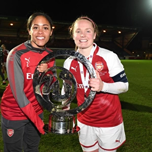 Arsenal Women's Continental Cup Victory: Alex Scott and Kim Little Celebrate with the Trophy