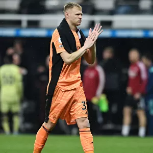 Arsenal's Aaron Ramsdale Reacts After Newcastle United Clash in Premier League