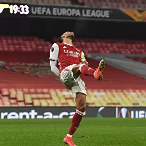 Arsenal's Aubameyang Expresses Frustration in Empty Emirates During Europa League Match vs. Olympiacos