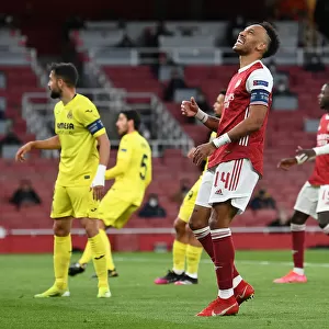 Arsenal's Aubameyang Fights for Europa League Victory Alone at Emptied Emirates Amidst Pandemic