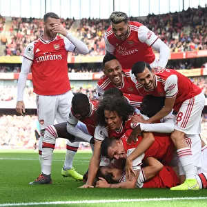Arsenal's David Luiz Scores and Celebrates with Team against AFC Bournemouth in 2019-20 Premier League