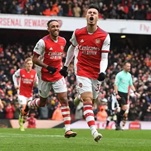 Arsenal's Deadly Duo: Martinelli and Aubameyang Fire Arsenal to 2-1 Victory over Newcastle United (Premier League 2021-22)