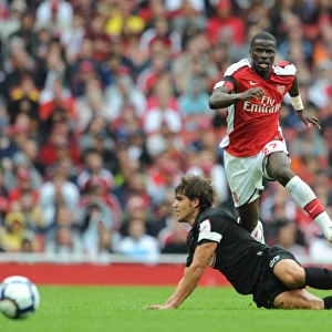 Arsenal's Eboue vs. Dominguez: A Battle at the Emirates Cup, 2009