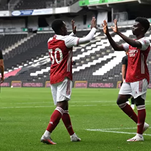 Arsenal's Eddie Nketiah and Bukayo Saka Celebrate Goals in MK Dons Friendly, 2020