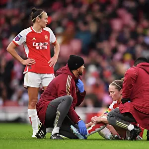 Arsenal's Kim Little Receives Medical Treatment During Intense Arsenal vs. Chelsea Clash in Barclays Women's Super League