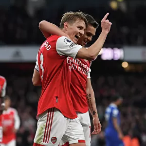 Arsenal's Martin Odegaard and Leandro Trossard Celebrate Goal Against Chelsea in 2022-23 Premier League