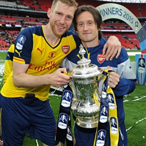 Arsenal's Per Mertesacker and Tomas Rosicky Celebrate FA Cup Victory