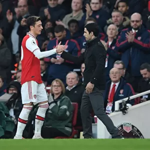 Arsenal's Mikel Arteta and Mesut Ozil Share a Moment Amidst Arsenal FC vs Chelsea FC Rivalry, Premier League 2019-20
