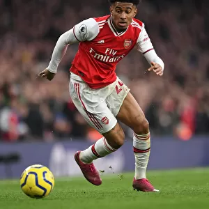 Arsenal's Nelson Faces Off Against Chelsea in Premier League Clash at Emirates Stadium