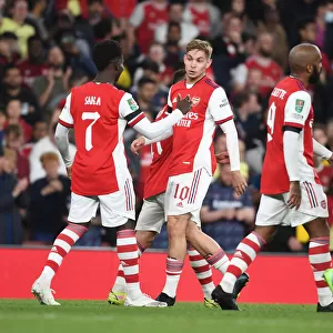 Arsenal's Smith Rowe and Saka Celebrate Goals Against AFC Wimbledon in Carabao Cup