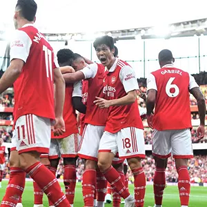 Arsenal's Tomiyasu and Saka Celebrate 2nd Goal Against Liverpool in 2022-23 Premier League
