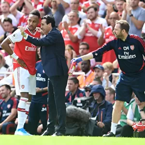 Arsenal's Unai Emery Coaches Aubameyang Amidst Premier League Action vs Burnley (2019-20)