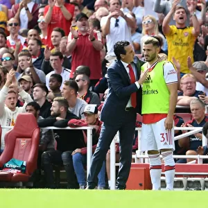 Arsenal's Unai Emery Coaches Sead Kolasinac Amidst Premier League Action Against Burnley