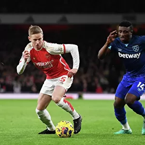 Arsenal's Zinchenko Fends Off West Ham's Kudus in Premier League Clash (2023-24)