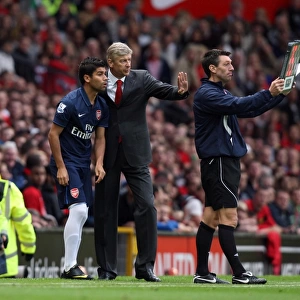 Arsene Wenger the Arsenal Manager gives Eduardo