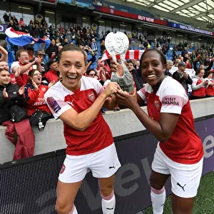 Celebration: McCabe and Carter's Winning Moment for Arsenal Women vs. Brighton & Hove Albion