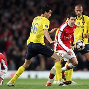 Cesc Fabregas (Arsenal) Sergio Busquets and Thierry Henry (Barcelona). Arsenal 2