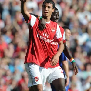 Chamakh and Eboue: Arsenal's Unstoppable Duo Celebrates 4-1 Victory Over Blackburn Rovers