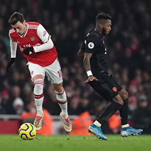 Clash of the Midfield Maestros: Ozil vs Fred in Arsenal vs Manchester United Premier League Battle (2019-20)