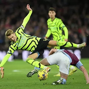 Clash of Midfield Titans: Odegaard vs McGinn in Aston Villa vs Arsenal FC (2023-24)