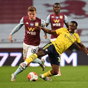 Clash at Villa Park: Nketiah vs. Targett in Premier League Showdown (Aston Villa vs. Arsenal, 2019-20)