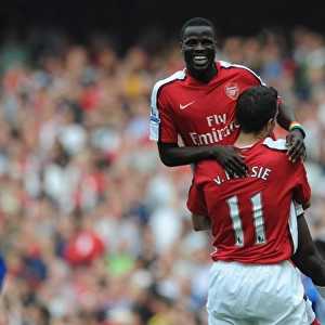 Eboue and van Persie: Unstoppable Arsenal Duo Celebrates 4-0 Over Wigan Athletic