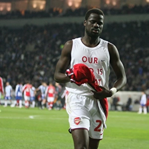 Eboue's Emotional Moment: Arsenal Defender Throws Shirt to Adoring Fans after FC Porto Defeat