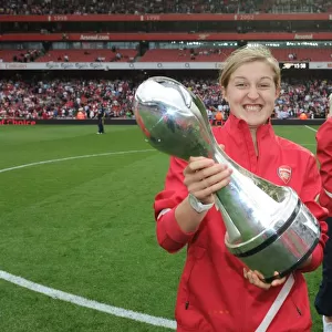 Ellen White's Double Victory: Arsenal's WSL Title Celebration Amidst Premier League Action (2011)