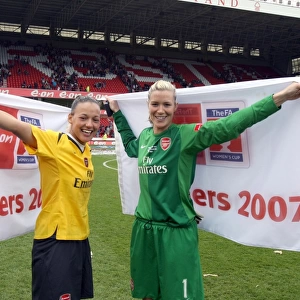 Emma Byrne and Lianne Sanderson (Arsenal) celebrate at the end of the match