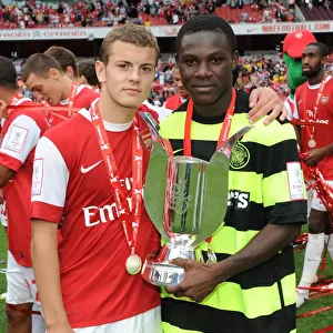 Jack Wilshere and Emmanuel Frimpong (Arsenal) with the Emirates Cup Trophy