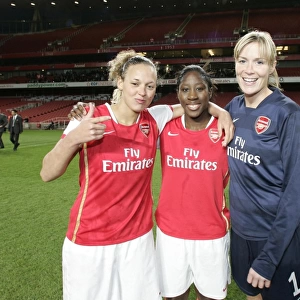 (L>R) Lianne Sanderson, Anita Asant and Emma Byrne (Arsenal) celebrate winning the league