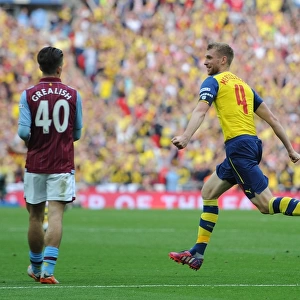 Per Mertesacker's Game-Winning Goal: Arsenal Claims FA Cup Victory over Aston Villa