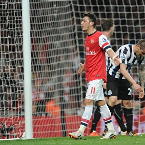 Mesut Ozil celebrates scoring Arsenals 2nd goal. Arsenal 2: 0 Newcastle United. Barclays